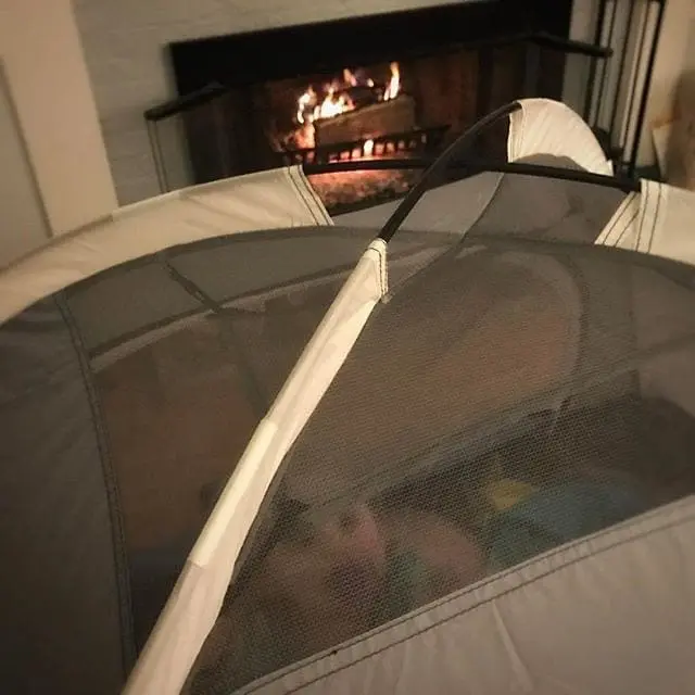 When your kids want to camp, but Spring temps drop back into the 20s. #IndoorCamping #Fireplace