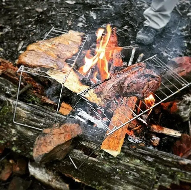Slabs of steak over an open fire? Don’t mind if a do. #Grilling #Steak #CampFire #Meat