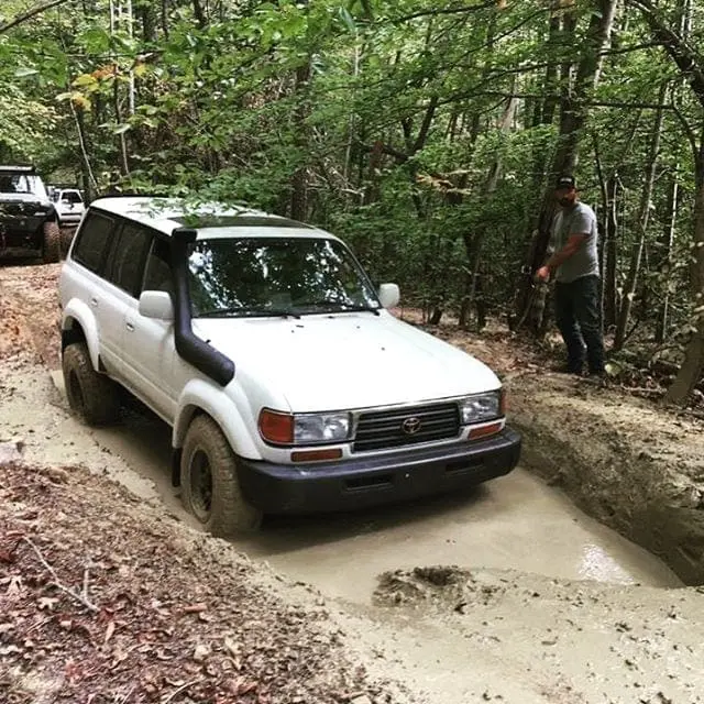 Nothing to see here. Just a Toyota Land Cruiser in the mud.