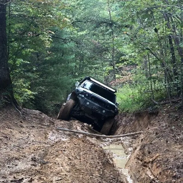 The end of a 200 ft muddy hill climb and slider doing work! #FJcruiser #Climbing #Mudding